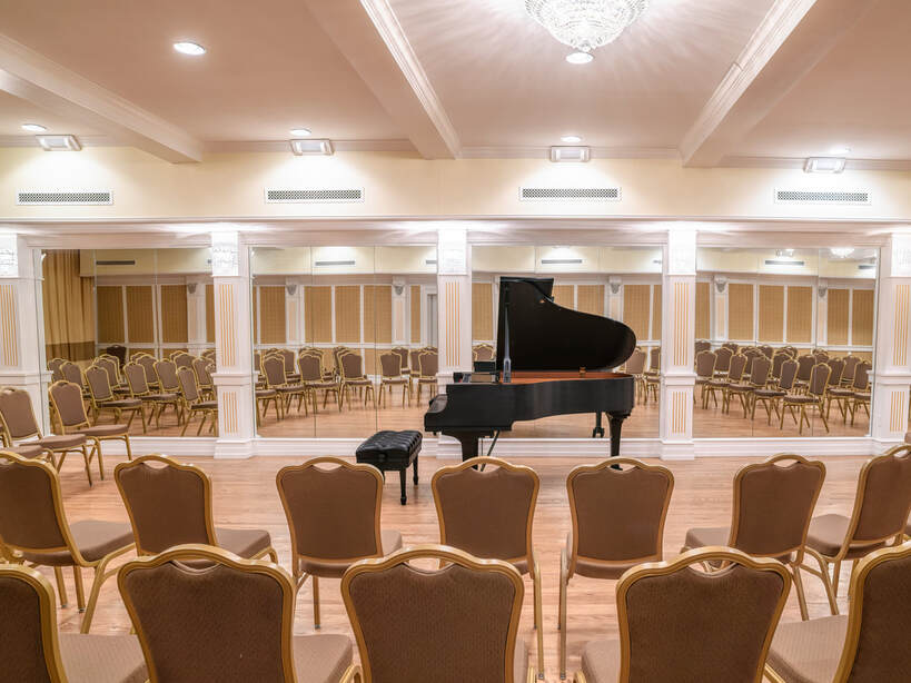 Restored historic ballroom. Intimate chamber music. Great music up close.